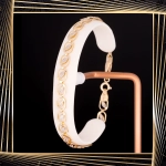 B381 Złota bransoletka. Dwukolorowe elementy. 585