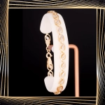 B381 Złota bransoletka. Dwukolorowe elementy. 585