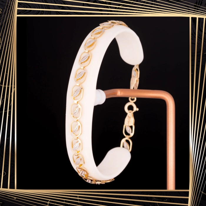 B381 Złota bransoletka. Dwukolorowe elementy. 585