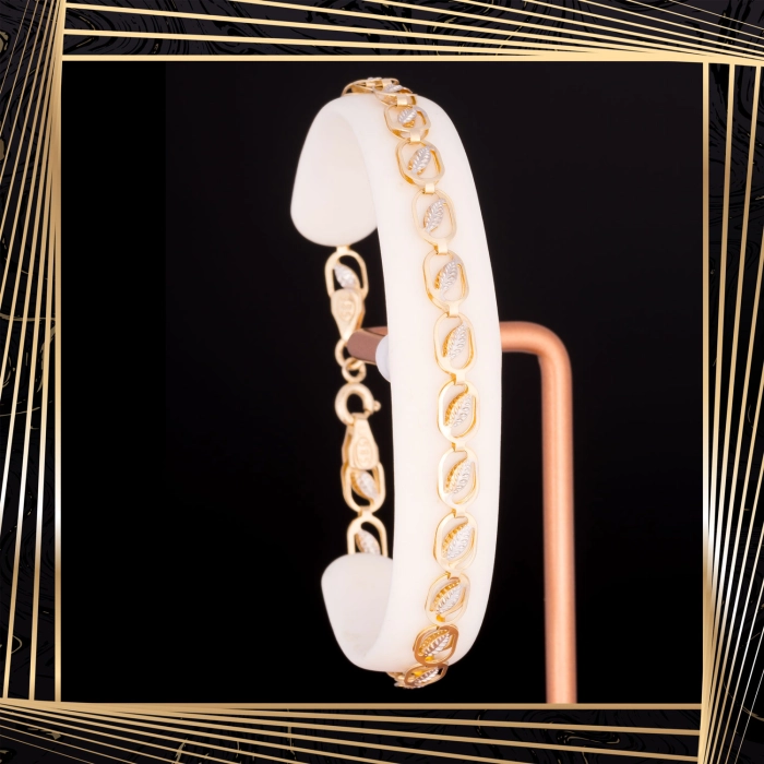 B381 Złota bransoletka. Dwukolorowe elementy. 585