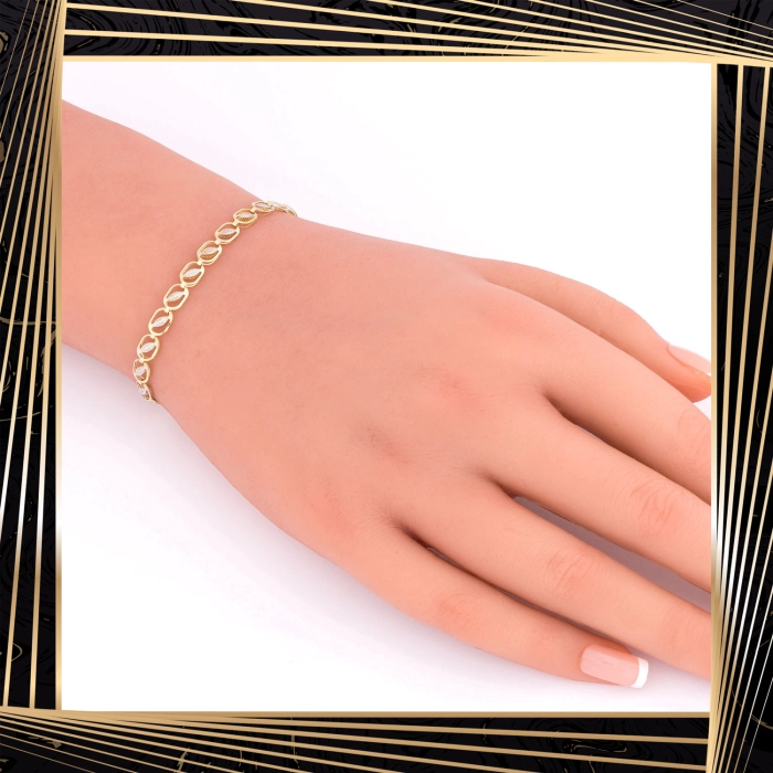 B381 Złota bransoletka. Dwukolorowe elementy. 585