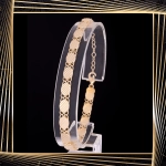 B395 Złota bransoletka. Diamentowane talerzyki. 585