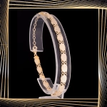 B395 Złota bransoletka. Diamentowane talerzyki. 585