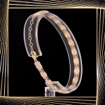 B395 Złota bransoletka. Diamentowane talerzyki. 585