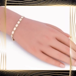 B395 Złota bransoletka. Diamentowane talerzyki. 585