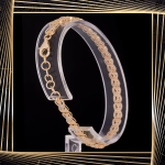 B398 Złota bransoletka. Ażurowe elementy z cyrkoniami. 585