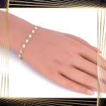 B399 Złota bransoletka. Diamentowane talerzyki. 585