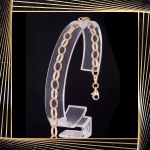 B405 Złota bransoletka. Elementy owalne w stylu ankier. 585