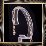 B405 Złota bransoletka. Elementy owalne w stylu ankier. 585