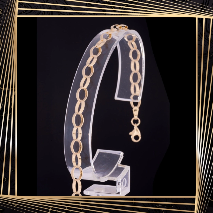 B405 Złota bransoletka. Elementy owalne w stylu ankier. 585