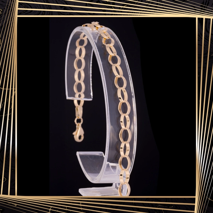 B405 Złota bransoletka. Elementy owalne w stylu ankier. 585