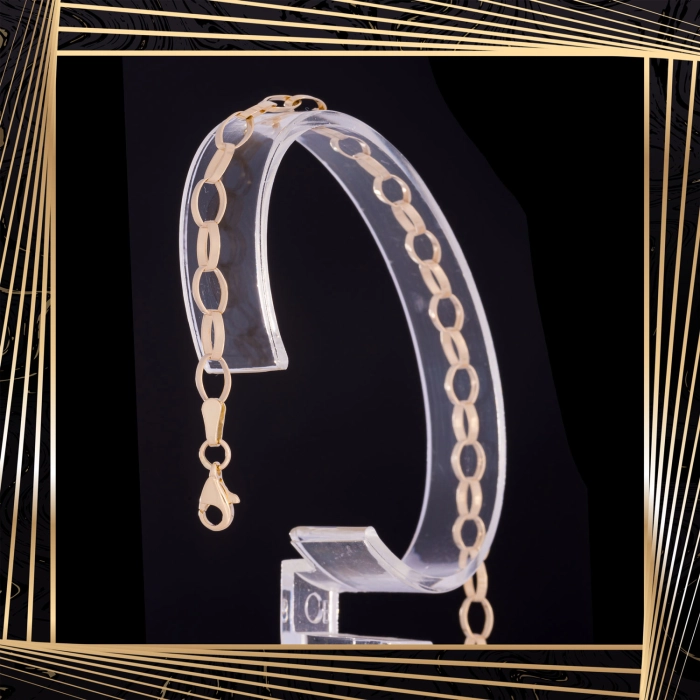 B405 Złota bransoletka. Elementy owalne w stylu ankier. 585