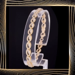 B406 Złota bransoletka. Dwukolorowe elementy. 585