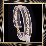 B406 Złota bransoletka. Dwukolorowe elementy. 585