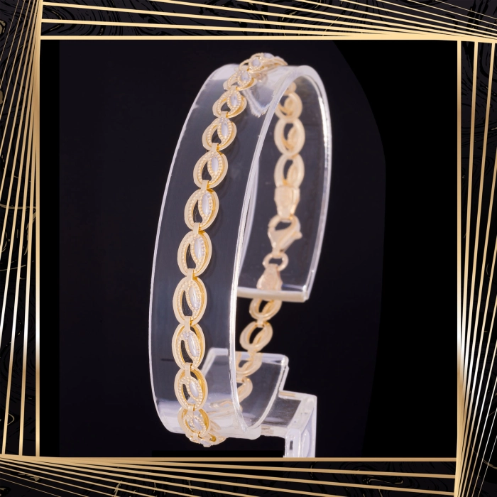 B406 Złota bransoletka. Dwukolorowe elementy. 585