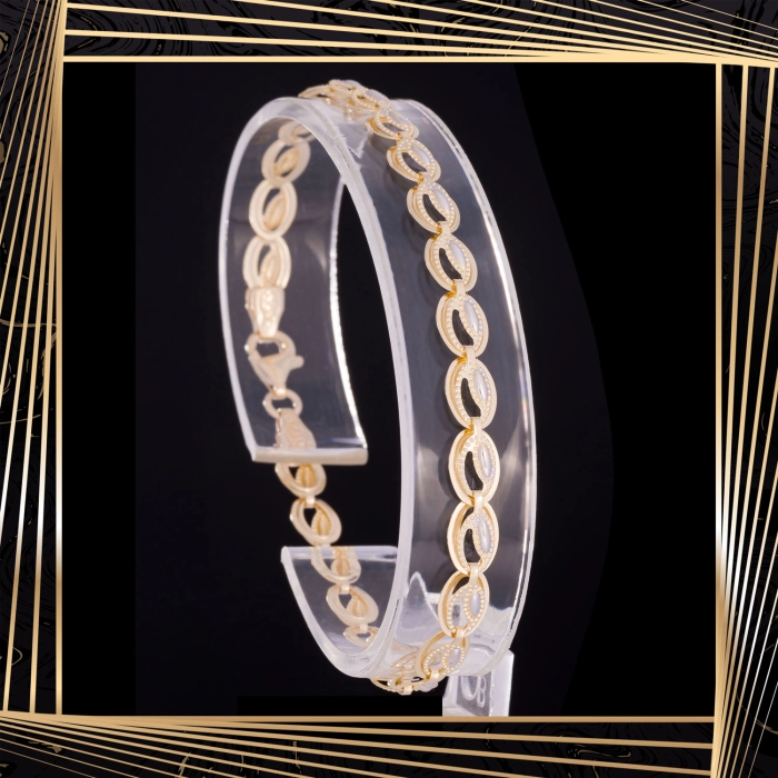 B406 Złota bransoletka. Dwukolorowe elementy. 585