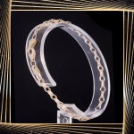 B407 Złota bransoletka. Elementy owalne w stylu ankier. 585