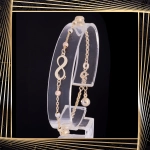 B408 Złota bransoletka. Nieskończoność z koralikami. 585