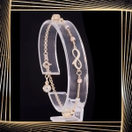 B408 Złota bransoletka. Nieskończoność z koralikami. 585