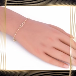 B408 Złota bransoletka. Nieskończoność z koralikami. 585