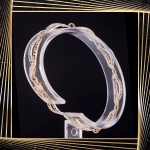 B409 Złota bransoletka. Dwukolorowe elementy z drogą grecką. 585