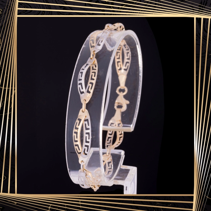 B409 Złota bransoletka. Dwukolorowe elementy z drogą grecką. 585