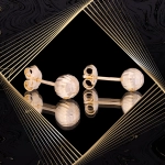 K1669 Złote kolczyki. Złote kuleczki z diamentowanym szlifem. 585