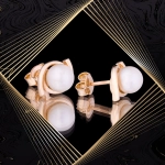 K1670 Złote kolczyki. Złote wstążki z perłami. 585