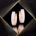 K1680 Złote kolczyki. Złote owale z diamentowanym wzorem. 585