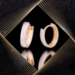 K1680 Złote kolczyki. Złote owale z diamentowanym wzorem. 585