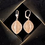 K1704 Złote kolczyki. Przestrzenne baryłki  z kwiecistym ażurem. Duże. 585