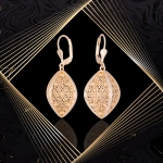 K1704 Złote kolczyki. Przestrzenne baryłki  z kwiecistym ażurem. Duże. 585