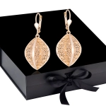 K1704 Złote kolczyki. Przestrzenne baryłki  z kwiecistym ażurem. Duże. 585