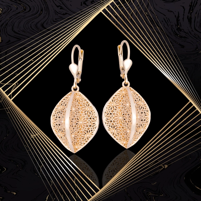 K1704 Złote kolczyki. Przestrzenne baryłki  z kwiecistym ażurem. Duże. 585