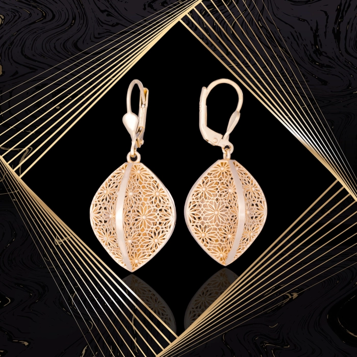 K1704 Złote kolczyki. Przestrzenne baryłki  z kwiecistym ażurem. Duże. 585