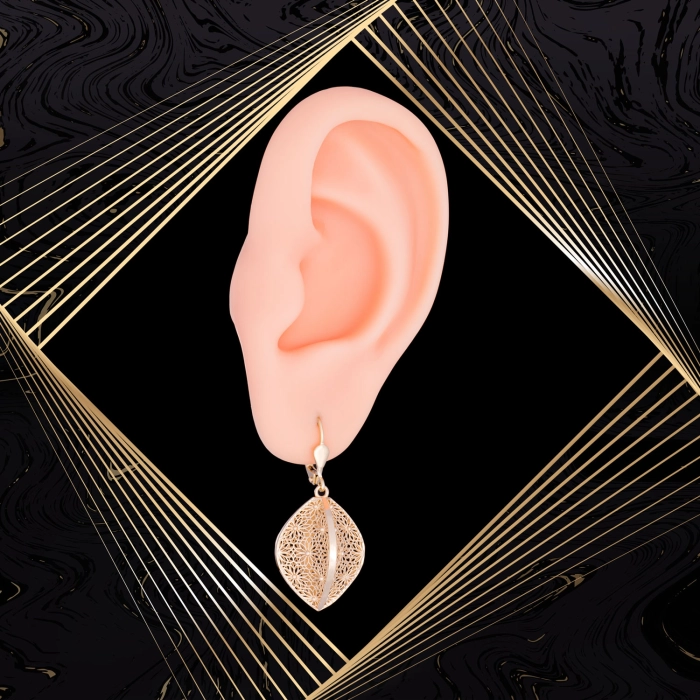 K1704 Złote kolczyki. Przestrzenne baryłki  z kwiecistym ażurem. Duże. 585