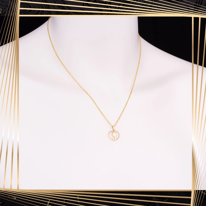 W859 Złoty wisiorek. Złoty medalik. Serduszko. Matka Boska. 585