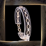 B298 Złota bransoletka. Dwukolorowe płaskie ogniwa. 585