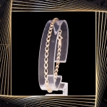 B324 Złota bransoletka z owalnymi elementami. 585