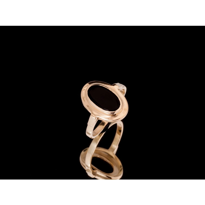P766 Złoty pierścionek z owalnym onyxem. 333