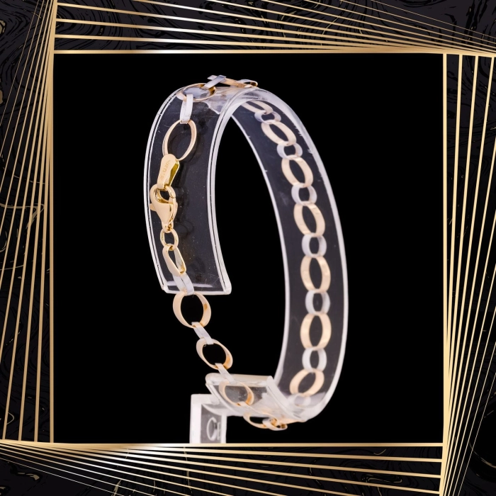 B298 Złota bransoletka. Dwukolorowe płaskie ogniwa. 585