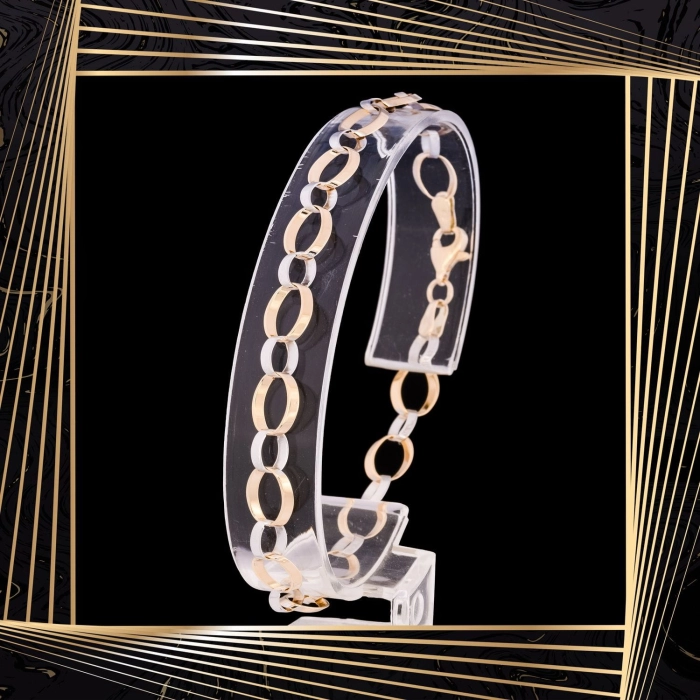 B298 Złota bransoletka. Dwukolorowe płaskie ogniwa. 585