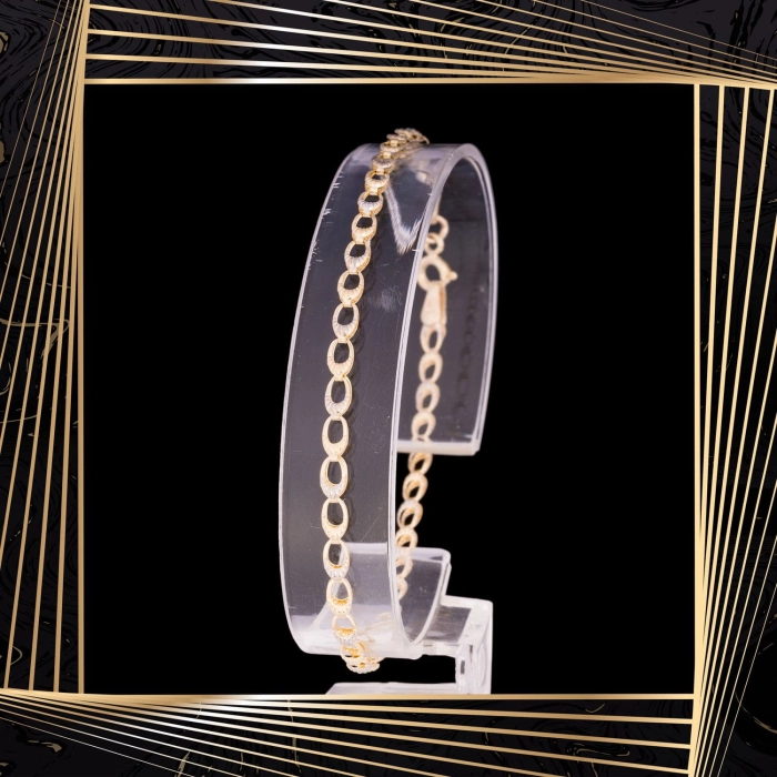 B324 Złota bransoletka z owalnymi elementami. 585