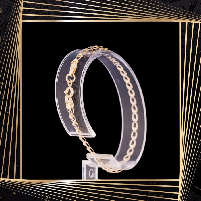 B324 Złota bransoletka z owalnymi elementami. 585